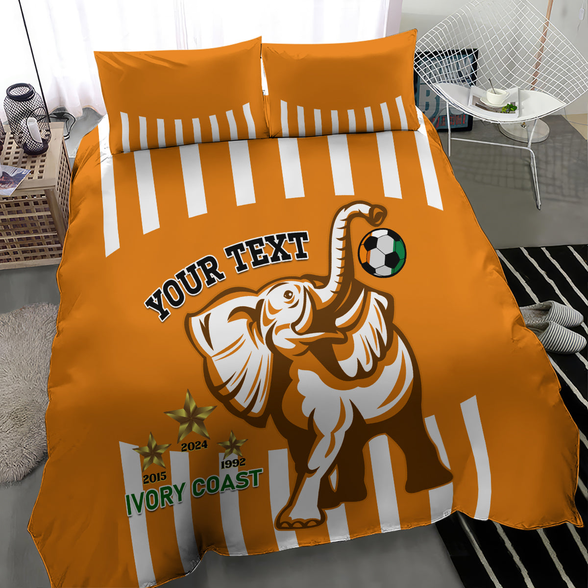 Orange football bedding set with striped duvet and pillowcases, elephant mascot soccer theme