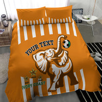 Orange football bedding set with striped duvet and pillowcases, elephant mascot soccer theme
