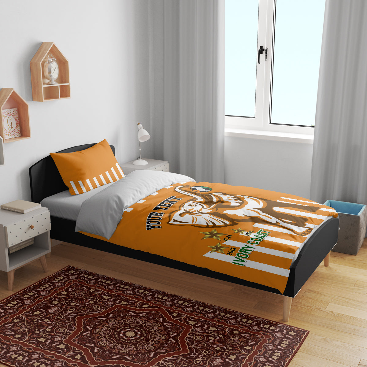 Orange football bedding set on a bed with striped pillows and elephant soccer duvet