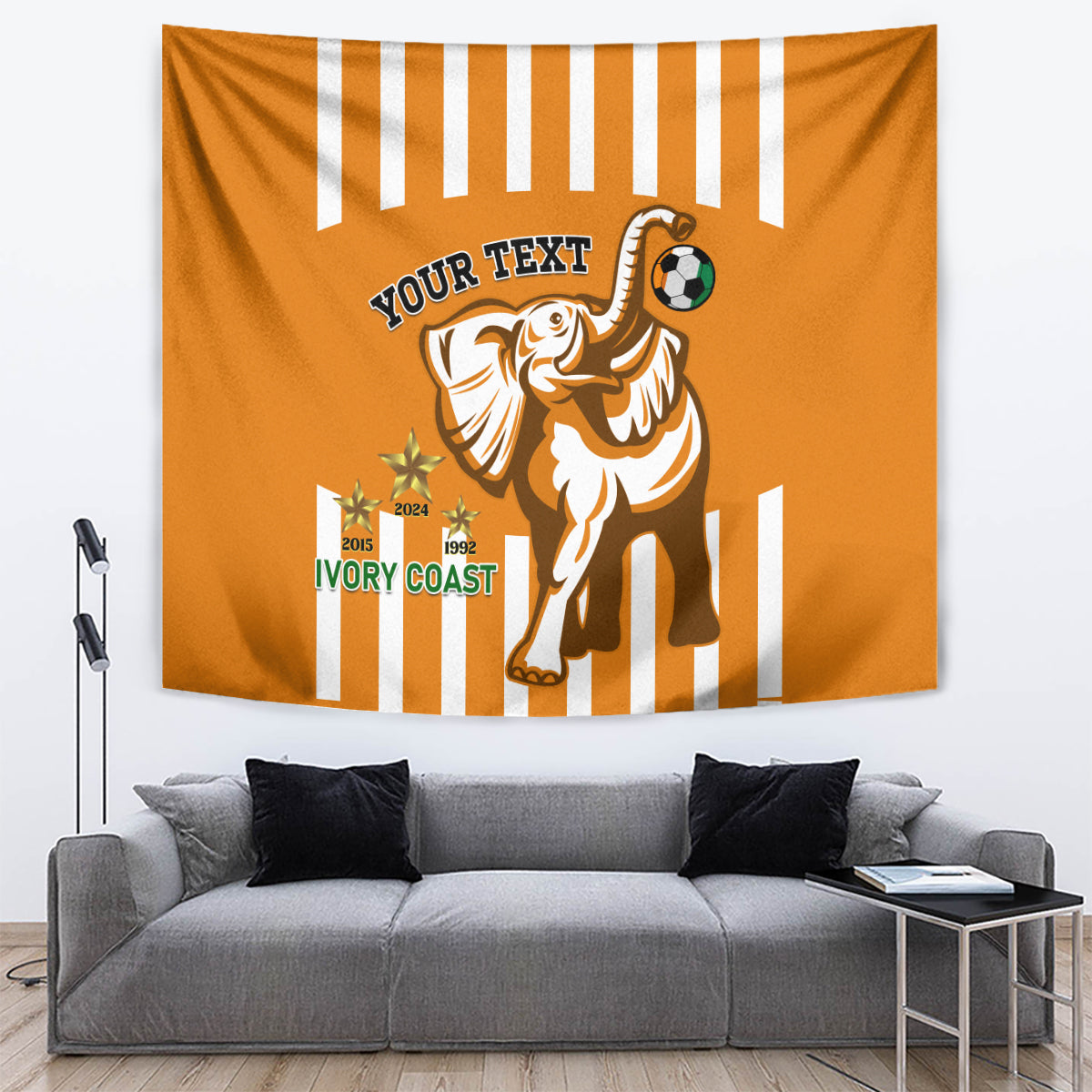 Orange football tapestry showing a large elephant with soccer ball and 'YOUR TEXT' top banner
