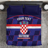 Blue football bedding set with crest graphic and red-white stripe design on duvet