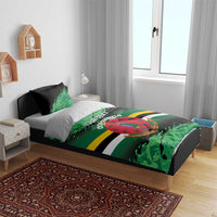 Personalized Dominica bedding set on wooden bed frame with green camo crest and “YOUR TEXT”