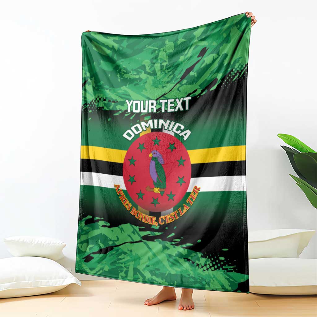 Green printed throw blanket with Dominica crest emblem, stripes, and 'YOUR TEXT'