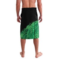 Green black lavalava skirt with elastic waistband, camouflage-style hem print