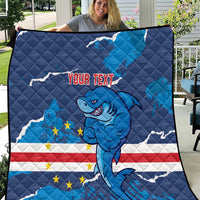 Blue quilt blanket with smiling shark mascot, EU-style flag stars, and custom text