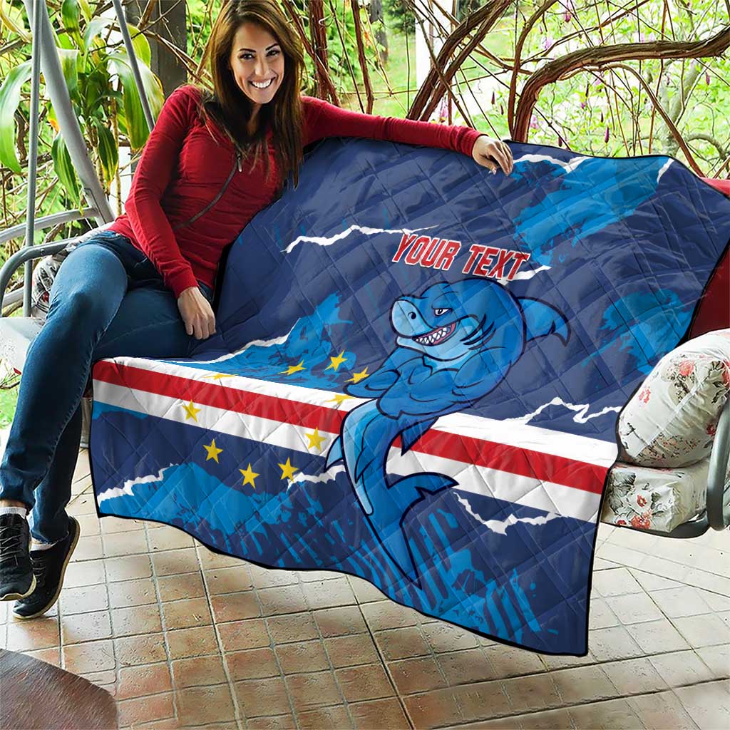 Blue quilt blanket with shark mascot and flag stars and stripes, shown with “Your text”
