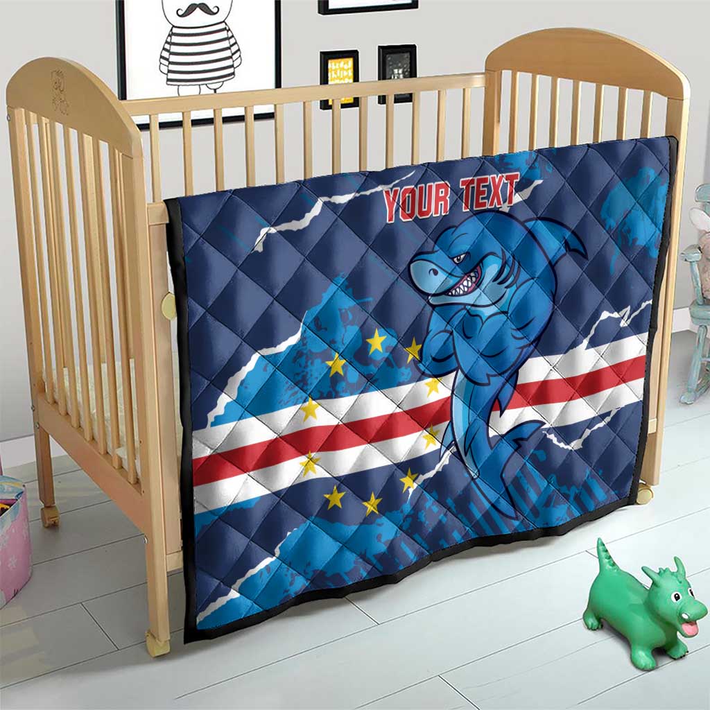 Blue quilt blanket for crib with shark mascot, stars and stripes, and custom “Your text”