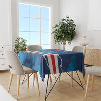 Blue football tablecloth with dolphin mascot, red-white stripes, and star accents