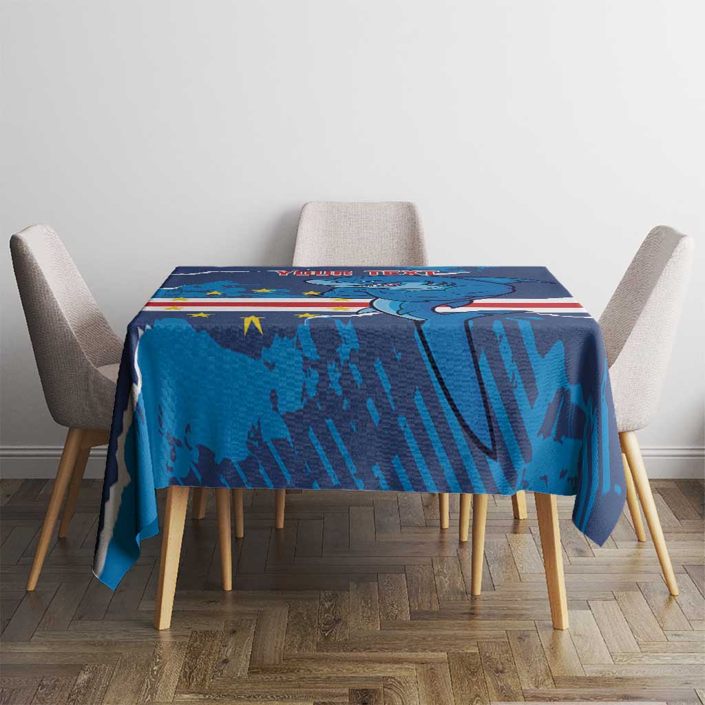 Blue football tablecloth on table with dolphin mascot print and red-white stripe center