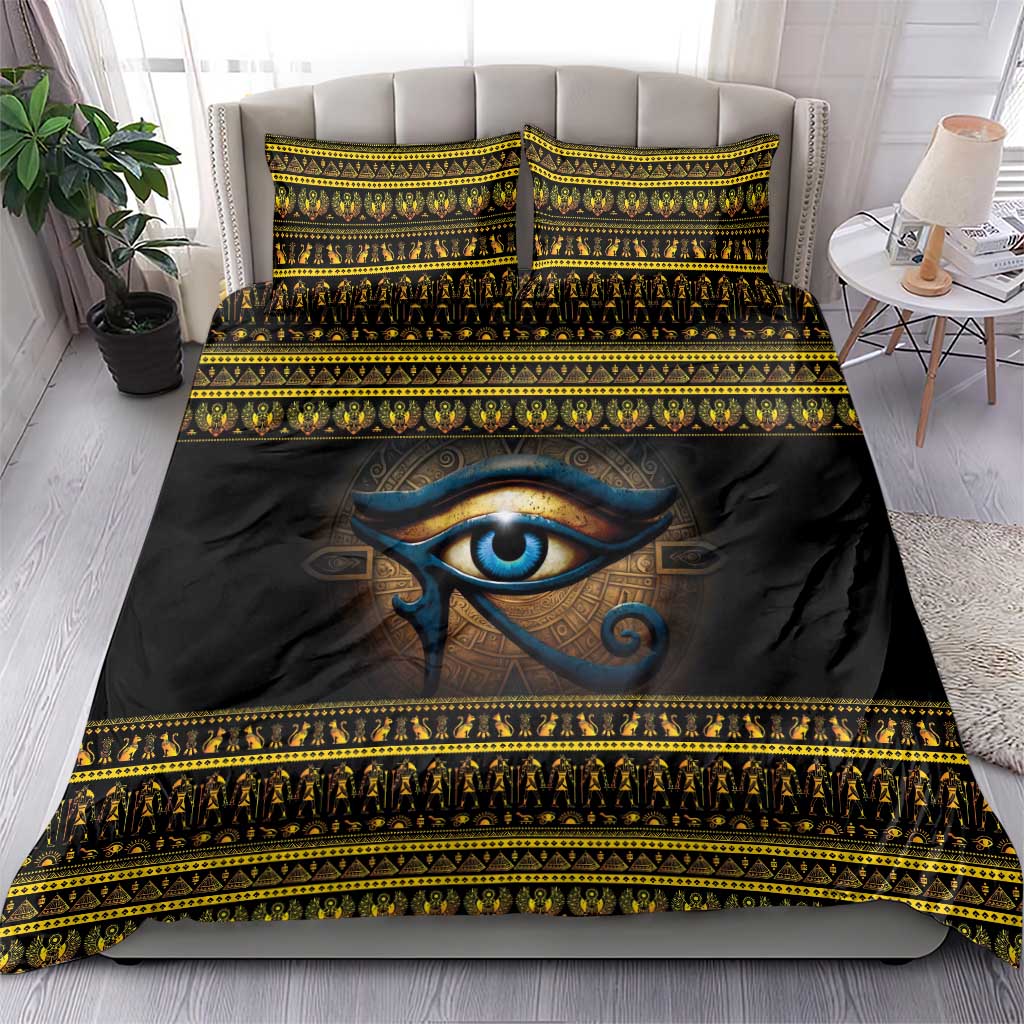 Black duvet cover with blue Eye of Ra center, gold geometric borders, with pillows