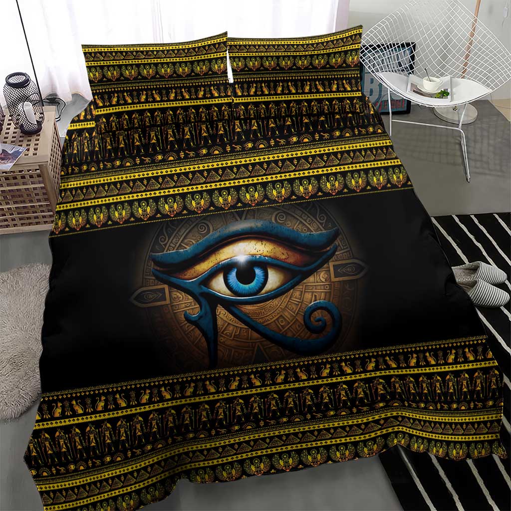 Black duvet cover with blue Eye of Ra motif and gold-and-yellow ornamental banding