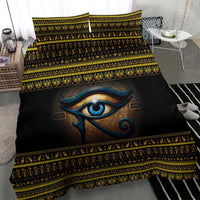 Black duvet cover with blue Eye of Ra motif and gold-and-yellow ornamental banding