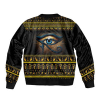 Black bomber jacket with zip and gold border, Eye of Ra graphic on back panel