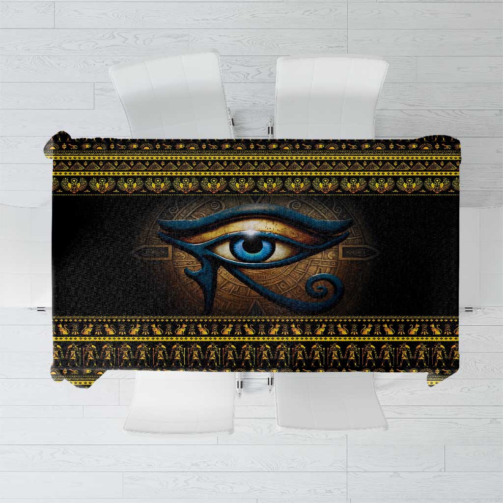 Black Eye of Ra tablecloth with blue eye design and gold trim, laid flat