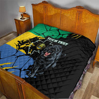 Black quilt on a wooden bed, green yellow blue flag map with panther and custom text