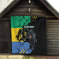 Black quilt hanging outdoors under a roof, green yellow blue map with panther and custom text