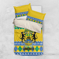 Single duvet and two pillowcases in yellow, green, and blue with Gabon coat of arms.