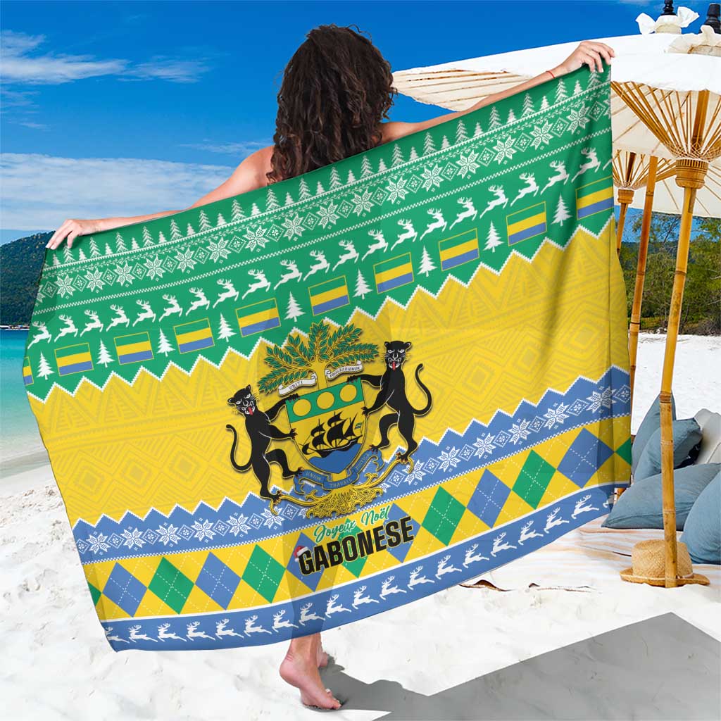 Gabon Christmas sarong with green, yellow, blue geometric pattern and crest, hem fringe