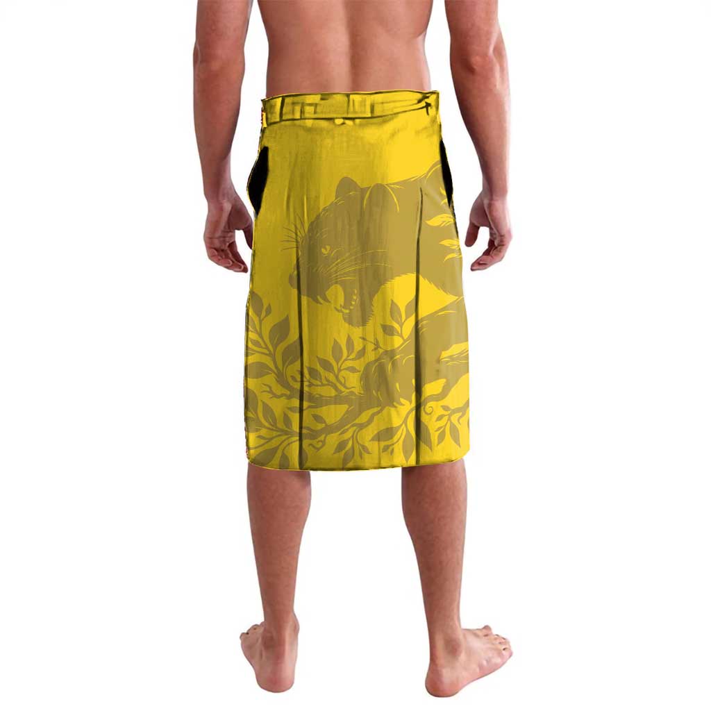 Yellow football lavalava with green waistband and patterned jungle-style silhouettes