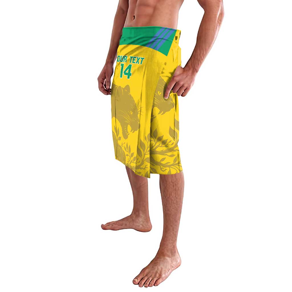 Yellow football lavalava with green waistband, side view showing number 14 and graphics