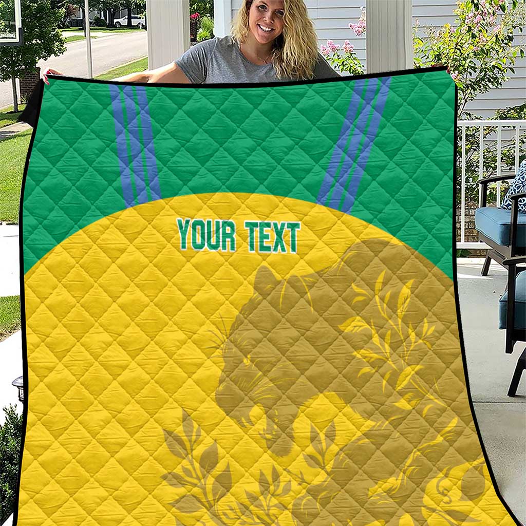Custom football quilt blanket large view, green and yellow with “YOUR TEXT” centered logo