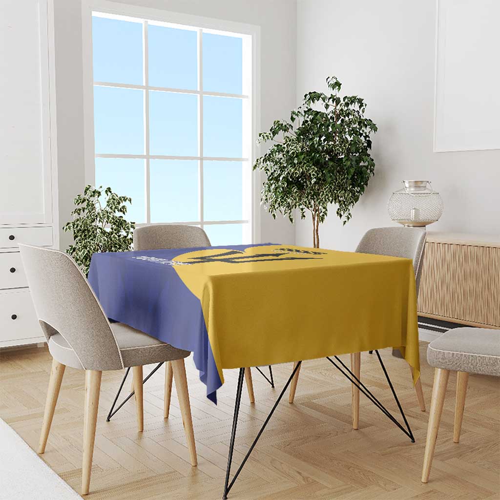 Blue and yellow football tablecloth with Barbados team graphic, draped over dining table