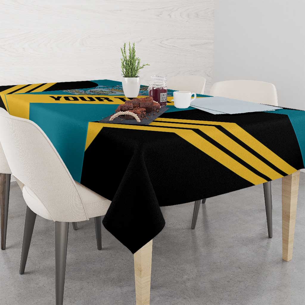 Football tablecloth on a dining table with black and yellow diagonal stripes over aquamarine.