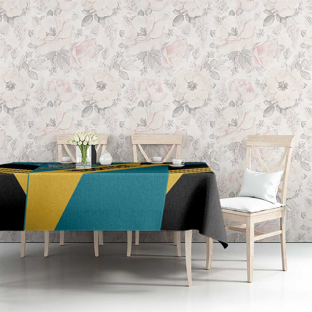 Football tablecloth on dining set; aquamarine center with black and yellow diagonal stripe panels.