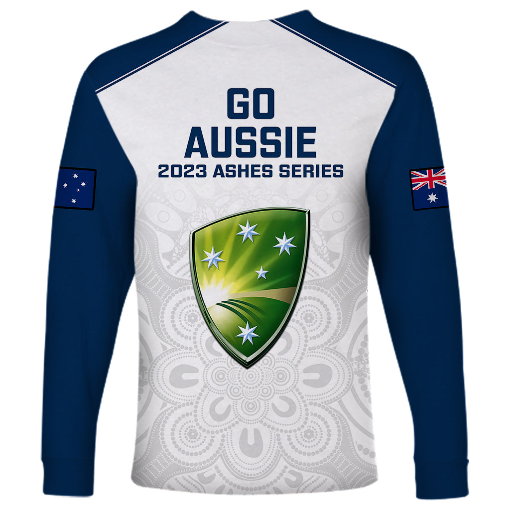 White and navy long-sleeve cricket shirt with Go Aussie 2023 Ashes badge and icons