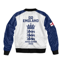 White and navy bomber jacket with GO ENGLAND back graphic and ribbed cuffs
