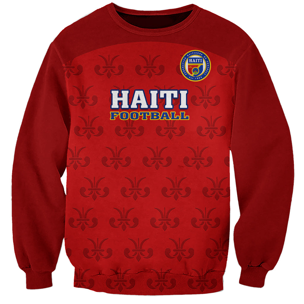Red crewneck football sweatshirt with Haiti Football crest and fleur-de-lis pattern