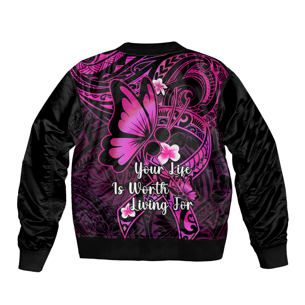 Unisex bomber jacket with black body, pink ornate back print, butterfly graphic and text.