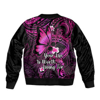 Unisex bomber jacket with black body, pink ornate back print, butterfly graphic and text.