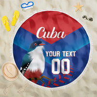 Round beach blanket with Cuba design, fringe edge, and blue/red bird graphic