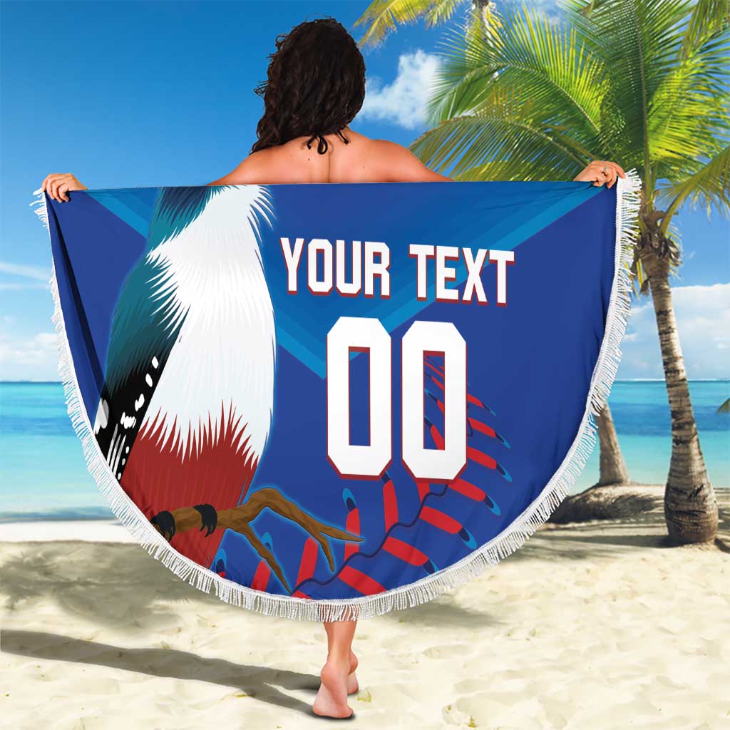 Round beach blanket with Cuba design, fringe edge, held up with bird graphic