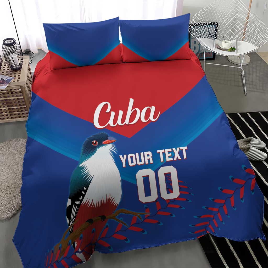 Blue and red bedding set with bird graphic, Cuba text, 'YOUR TEXT', and number '00'