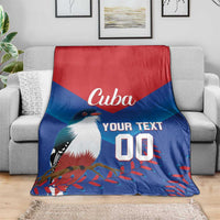 Cuba-themed blue and red throw blanket with white bird graphic and 'Your Text' number 00.