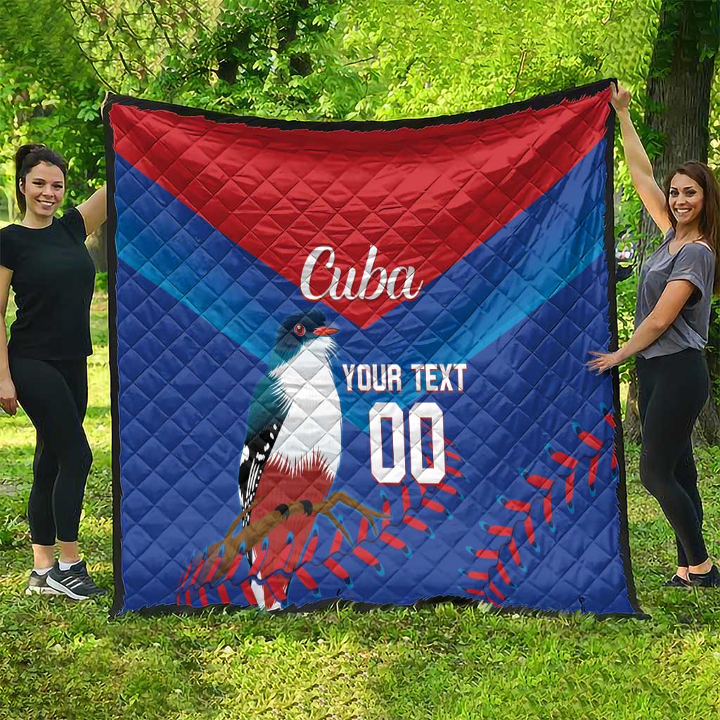 Blue and red Cuba quilt blanket draped outdoors, showing 'Cuba' and 'YOUR TEXT'