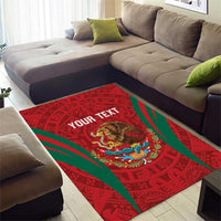 Red area rug with green diagonal stripes, Aztec-style artwork, eagle center and 'YOUR TEXT'