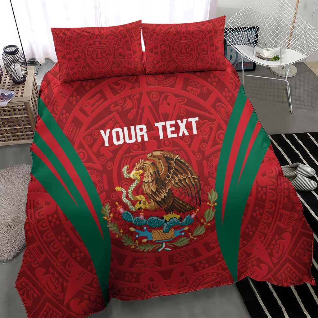 Red duvet and pillow shams with green rays and Aztec pattern, eagle center print