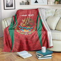 Custom blanket with red Aztec pattern, green stripes, and central eagle design