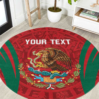 Round red rug with green aztec border, eagle artwork and 'YOUR TEXT' print.