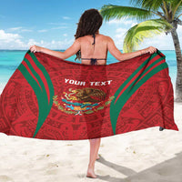 Red sarong with green border, aztec pattern and 'YOUR TEXT' on back, colorful emblem