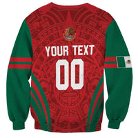 Unisex green sweatshirt with red Aztec pattern, crest, YOUR TEXT, and number 00 back