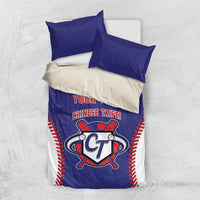 Blue duvet cover with two blue pillowcases and white backing featuring CT logo.