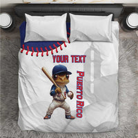 White baseball-style bedding set with Coqui mascot and red baseball stitching detail.