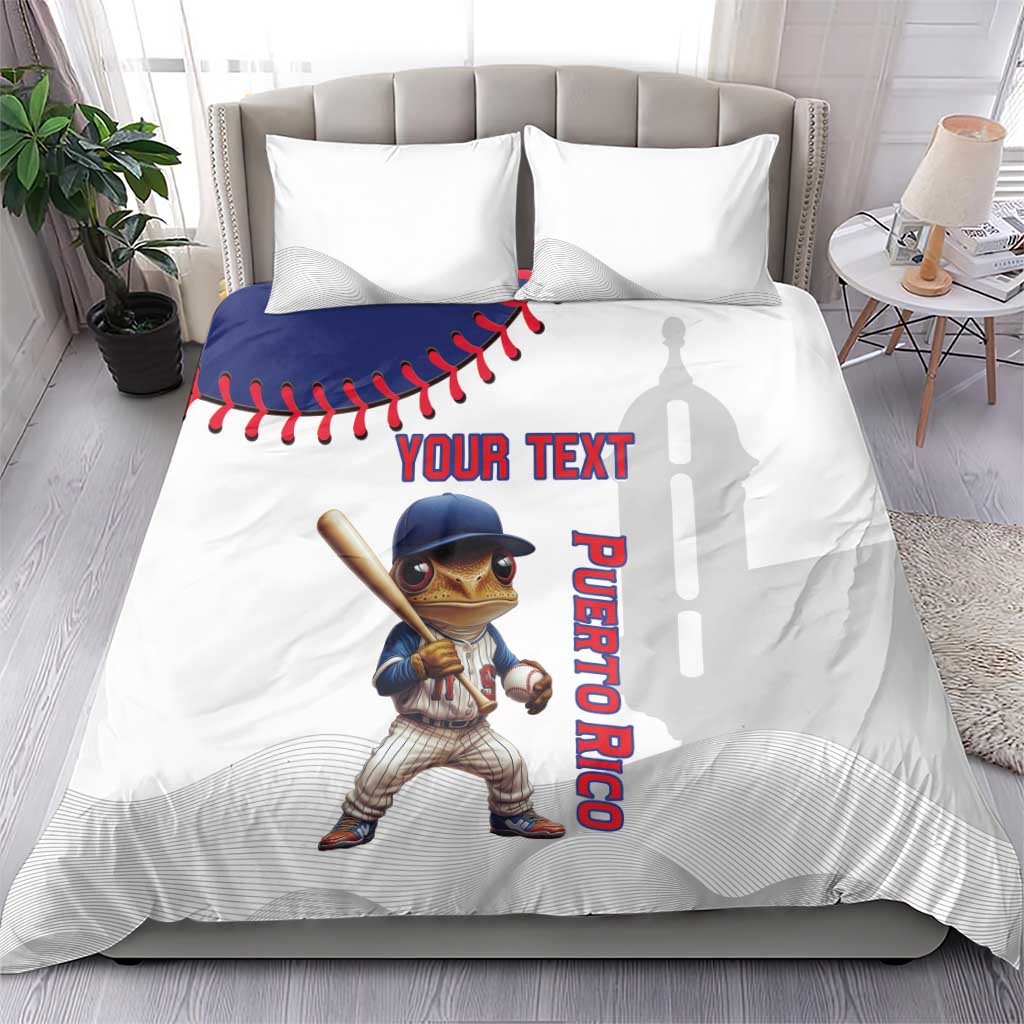 White bedding set with blue baseball graphic, Coqui mascot, and vertical Puerto Rico text.