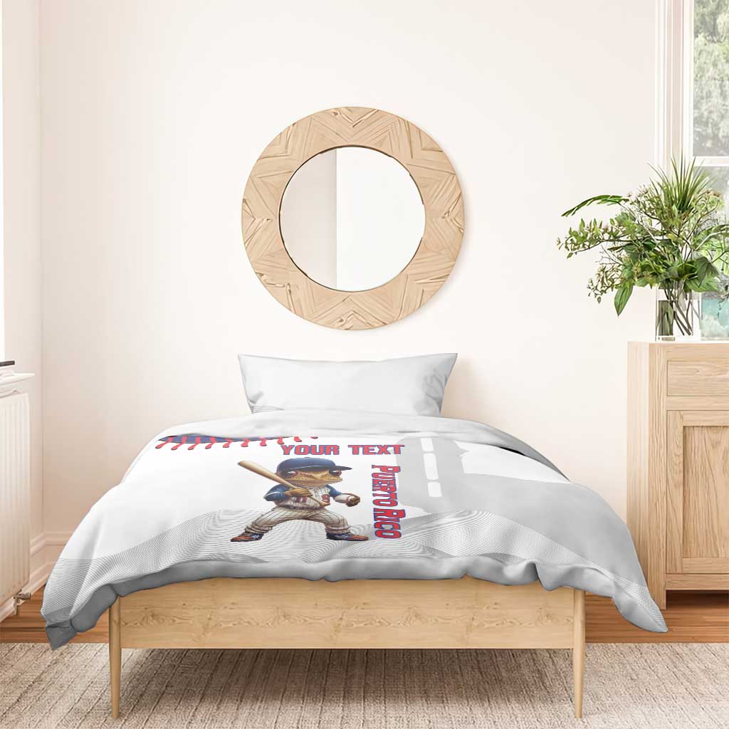 White bedding set with Coqui mascot, bat graphic, and vertical Puerto Rico word art.