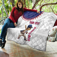 Folded custom baseball quilt, white and navy with Coqui mascot and Puerto Rico lettering