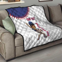 Custom baseball quilt draped on sofa, white with navy baseball arc and Coqui Puerto Rico art
